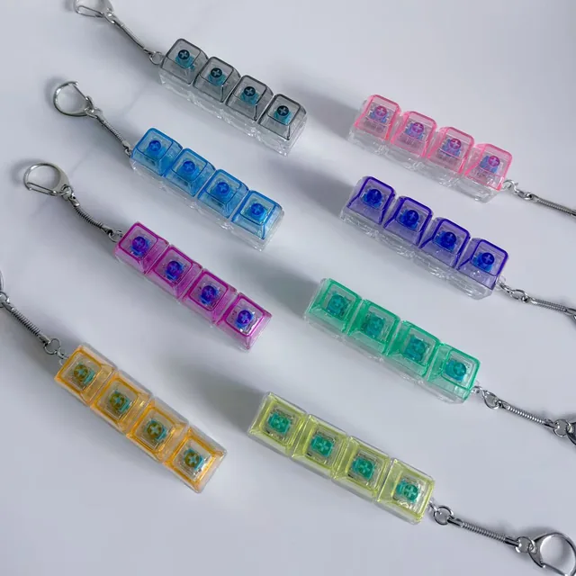 Transparent 4-Key Fidget Keyboard Keychain — Non-light wholesale product